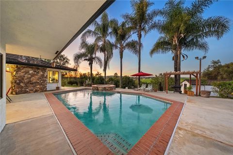 Photo of 1650 Winterwarm Drive, Fallbrook, CA 92028 (MLS # SW26007543)