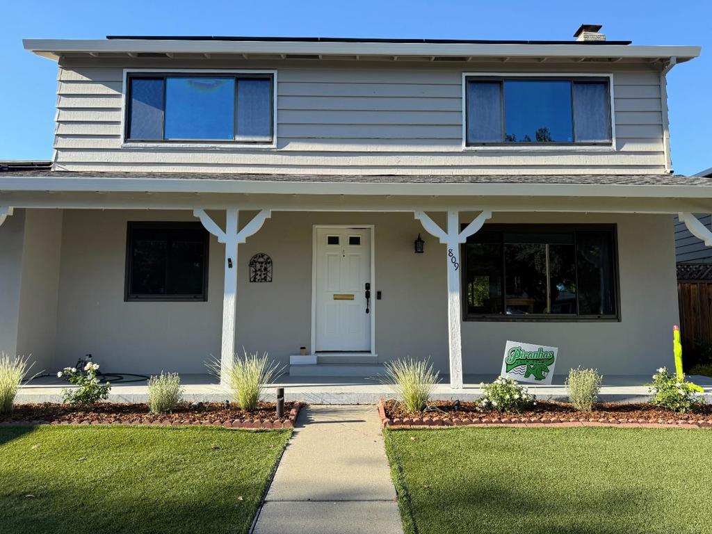 Check out this home with updated kitchen, bathrooms. Features 1 bedroom and half bath on main floor, 4 bedrooms and 2 bathrooms on second story. Updated kitchen, bathrooms and freshly painted inside and out. Entertain guests and family in the outdoor area with a tv already on a bracket. Kitchen stove, microwave, oven and washer and dryer are about one year old. Can become members of the local cabana club to enjoy hot summers in the pool.