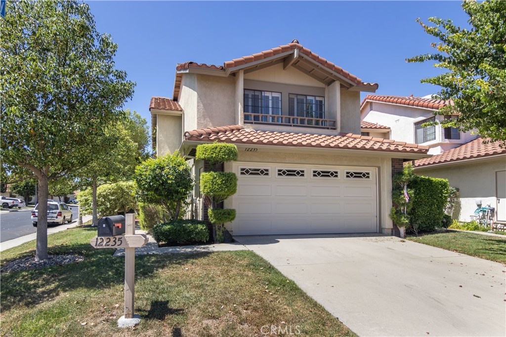 Charming 3 Bedroom, 2.5 Bath Home Located in the Beautiful Gate Guarded Porter Ranch Estates. No common walls or shared driveway. Living room features a wet bar and fireplace with built-in shelving plus French doors to the covered patio and cozy rear yard. Lovely dining alcove as well as breakfast area in the kitchen, which also overlooks the backyard. Large Primary Bedroom with extra sitting area and two closets, one which is a large walk-in. Dual sinks and large shower/tub. Two additional good-sized, secondary bedrooms upstairs share a large hall bathroom. Wonderful community with Pool, Spa, Tennis and Sport Courts. Great Location!