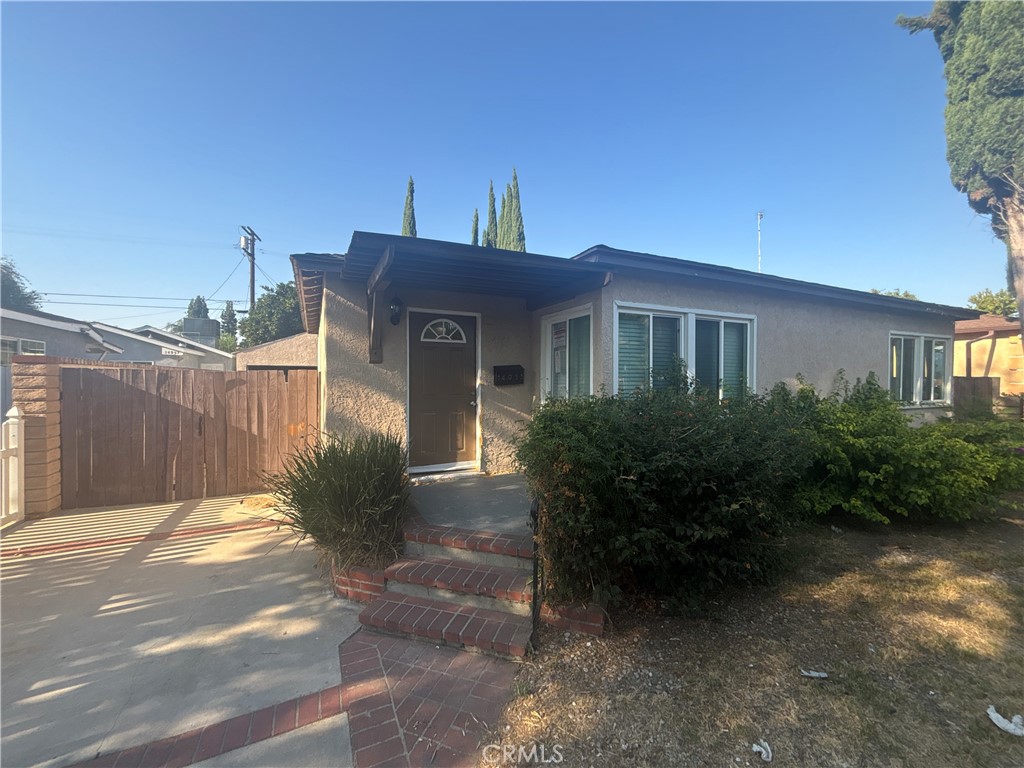 Well-located equity opportunity in Van Nuys featuring 3 bedrooms, 2 full bathrooms, and 1,368 sq ft of living space with a detached 2-car garage. The home offers an open living area with natural light, updated flooring, refreshed bathrooms, and a functional kitchen with plenty of storage. Private driveway, gated entry, and backyard patio provide additional potential. Great option for buyers or investors to add value and make it their own.