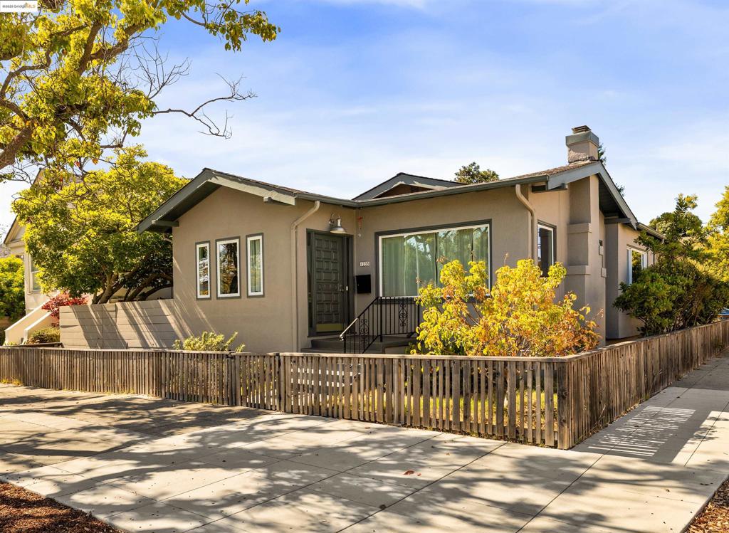 Searching for that elusive, easy-to-navigate single-story home? Look no further! Just five gentle steps lead to this light-filled Albany bungalow—circa 1929—offering classic charm with thoughtful modern updates. The approx. 1,510 sq ft floor plan features 4 bedrooms and 2 beautifully remodeled bathrooms with custom tile and elegant finishes. Just off the tiled entry, the 4th bedroom makes a perfect office with its own exterior door to a serene side garden. The spacious living/dining area features a cozy gas fireplace, while the remodeled kitchen shines with a subway tile backsplash, Corian counters, stainless steel appliances, tile flooring, and dining space. Natural light fills the home, highlighting stylish upgrades throughout. The primary suite includes an elegant en-suite bath. Situated on a 5,000 sq ft corner lot, the property includes a detached 2-car garage with possible ADU potential (check with city) and a formal back porch entry off Evelyn Street. Two additional off-street parking spaces and a professionally designed garden with native plants complete the picture. Great Albany location near Solano Ave, top schools, library, and transit. With a 93 Walk Score and 96 Bike Score, this location is as convenient as it is charming.