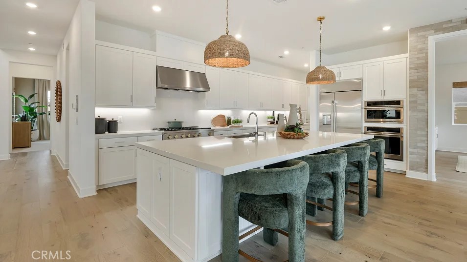 This expansive two-story home offers plenty of space with a total of 4 bedrooms with one of the bedrooms located downstairs with its own private bathroom. The first floor also offers a Den perfect for an office or gaming room. The rest of the first floor features an open layout from the modern kitchen that offers white cabinetry throughout, massive walk in pantry. The dining and family room opens to a covered California Room ideal for indoor-outdoor living. The second floor hosts a bonus room along with three more bedrooms all have their own private bathroom. The luxe owner's suite a retreat with a large walk in closet.