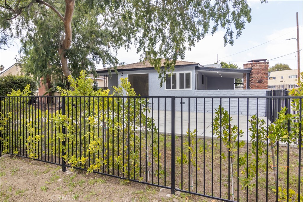 Welcome to 14701 & 14703 Covello St — Two Beautiful Homes on One Lot!
This exceptional Van Nuys property offers a spacious main residence and a stunning two-story ADU, ideally situated on a tree-lined corner lot in a quiet neighborhood.
The main home (14701 Covello) features 3 generously sized bedrooms and 2 updated bathrooms. Enjoy a bright and welcoming living room with a floor-to-ceiling window that fills the space with natural light and offers peaceful views of the front yard. The updated kitchen is equipped with newer appliances and cabinetry, providing both style and functionality. The large primary bedroom includes a versatile bonus room — perfect for a home office, nursery, or walk-in closet. Laundry hookups are conveniently located near the kitchen.
The ADU (14703 Covello), built in 2023, has its own private entrance and offers modern design across two levels. The open-concept first floor includes a spacious living and dining area, with a half bath for guests, while upstairs you'll find 2 comfortable bedrooms and a full bathroom. Currently rented on a month-to-month basis, the ADU presents a fantastic residential income opportunity to help offset your mortgage.
Sitting on a 5,775 SQFT corner lot, this unique property is just minutes from local shops, restaurants, and major freeways — offering both comfort and convenience in the heart of the Valley.
Don’t miss out on this rare opportunity — live in one and rent the other!