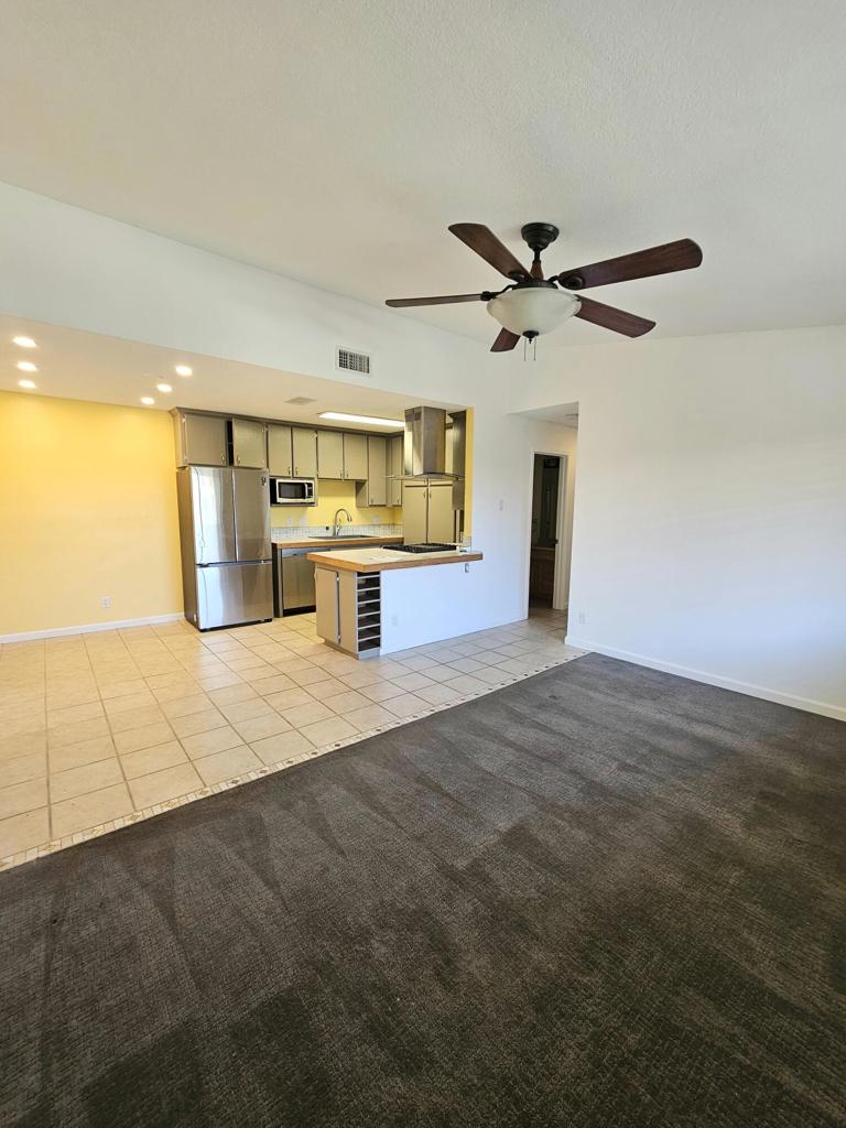 This Light & Bright upper level home is highly upgraded and features Vaulted ceilings throughout. Enjoy the remodeled Kitchen with bar seating area which includes newer refrigerator, dishwasher, microwave and Stove. Primary bedroom includes dual closets as well as a private balcony.. Full-sized washer and dryer included.Cathedral Springs is a gated community conveniently located 10 minutes from Downtown Palm Springs. Amenities include a fitness center as well as multiple pools and spas. One year lease. Sorry, No Pets