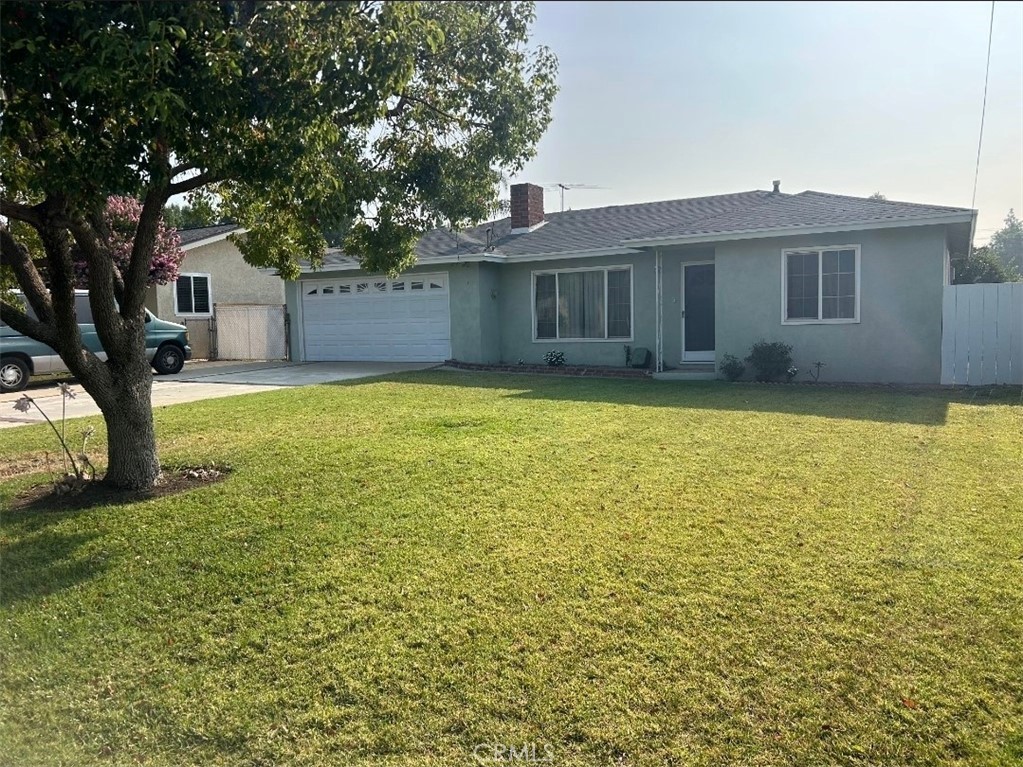 Located in a desirable area of Chino, this home sits on an expansive oversized lot measuring approximately 65' x 299', offering endless possibilities. The property features a spacious cement-covered patio with slab flooring, perfect for outdoor gatherings, a two-car attached garage, and a large driveway with ample parking space.