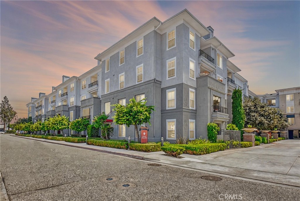 Welcome to 1801 E Katella Ave #2045, a modern 1-bedroom condo offering low-maintenance living in one of Anaheim’s most dynamic neighborhoods. Just a short walk from Angel Stadium and the Honda Center, this beautifully designed home puts you right in the middle of the energy, growth, and convenience the Platinum Triangle is known for. Inside, you'll find a spacious open-concept layout with a well-appointed kitchen featuring granite countertops, stainless steel appliances with a brand new microwave and refrigerator, and a functional breakfast bar. The bright living area flows seamlessly onto a private balcony—perfect for relaxing or entertaining. The large bedroom includes a walk-in closet and direct access to a stylish bathroom. You’ll also enjoy the practicality of in-unit laundry and central A/C. This residence is part of a thoughtfully planned community with incredible amenities: a resort-style pool surrounded by palms, a fully equipped fitness center, dry sauna, cozy fire pit, and secure building access. And here’s the kicker—your HOA dues include water and high-speed Wi-Fi, making it easier to manage monthly costs and enjoy peace of mind. Whether you're buying your first place or simply ready to enjoy a more connected lifestyle, this home delivers the ideal blend of comfort, convenience, and location. With new development happening at OC Vibe, this is more than just a great place to live—it’s a smart long-term move. Step into a fresh chapter in a home that feels both effortless and exciting.