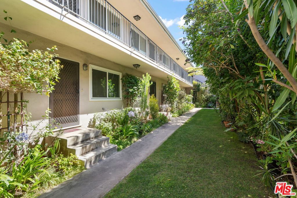 Nestled on a peaceful, tree-lined street in prime Santa Monica, this beautifully updated lower-level 1 bed, 1 bath condo blends timeless character with contemporary convenience. Step inside to find rich hardwood floors, dual-pane windows, and a bright, open layout that feels instantly inviting. Outside your front door, enjoy a serene garden-style complex with a shady, grassy common area perfect for morning coffee or a quiet read. Parking is a breeze with your own 1-car garage plus. Boasting a Walk Score of 89 and a Bike Score of 93, you're just moments from the beach, the pier, local shops, cafes, parks, and freeway. Access everything LA living has to offer, right at your doorstep.