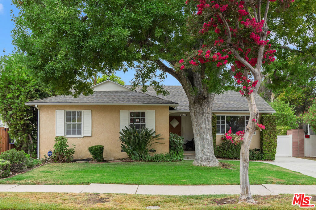 Welcome to 20763 Skouras Drive, a never-before-on-the-market, single-story home located in the heart of the San Fernando Valley. This charming residence offers approximately 1,736 square feet of comfortable living space, situated on a spacious 7,499-square-foot lot. Originally built in 1956, the home has been meticulously maintained by its single owner throughout. Move right in and enjoy or take this home to the next level and gain equity. The living room features a cozy decorative fireplace, creating an inviting space to relax or host guests. The three generously sized bedrooms and two full bathrooms provide peaceful retreats. Large den opens onto a rear patio. Central heating and air conditioning ensure year-round comfort throughout the home. Outside, the expansive lot offers ample space for outdoor living, gardening, or future expansion. Whether you're imagining a lush backyard oasis or a patio for weekend barbecues, the possibilities are endless. Additional features include a large driveway, detached garage, and a quiet, friendly neighborhood setting. Located in the Los Angeles Unified School District, this home is conveniently close to Pierce College, Warner Center, shopping, restaurants, and major freeways including the 101, 405, and 118. With its ideal blend of size and location, 20763 Skouras Drive presents a rare opportunity to own a property with considerable potential in a highly desirable part of the San Fernando Valley.