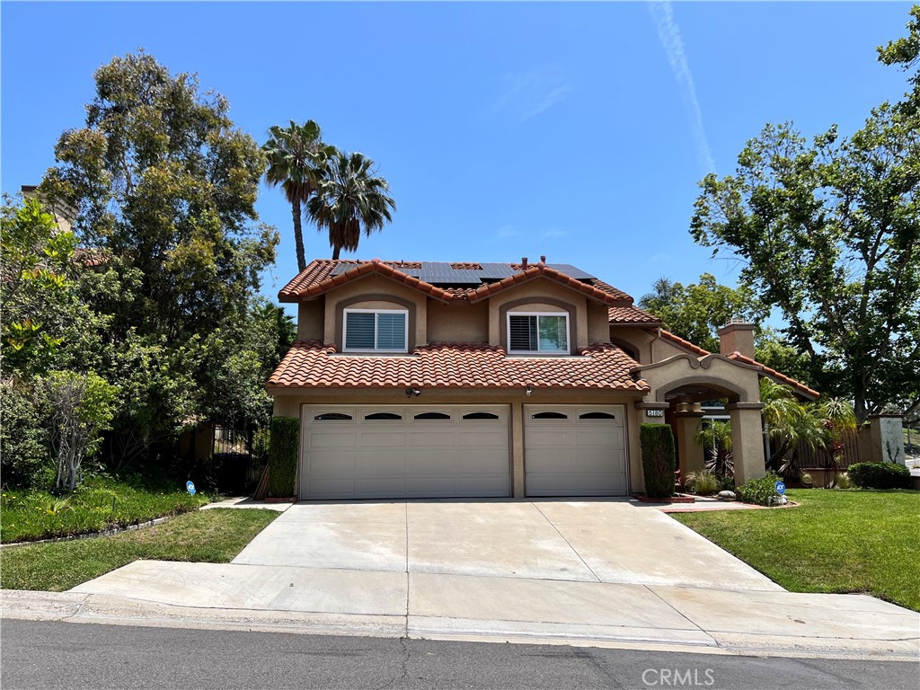 Beautifully, upgraded Eastlake Village home on a premiere corner cul-de-sac location, only one street away from the water!! This home features a bright and open floorplan with travertine stone with marble inlays, plantation shutters, recessed lighting, and dual pane windows. The gourmet kitchen features custom Cherrywood cabinetry, granite counters, high-end stainless-steel appliances which includes Viking gas range, Viking oven & microwave and Bosch Dishwasher. Kitchen is open to the Family room with Marble Fireplace and Serving bar. Down the hall is a DOWNSTAIRS BEDROOM with custom Murphy Bed plus bathroom with granite counter and slate walk-in shower. Spacious Master Suite which features walk out balcony, walk-in closet, master bathroom which includes Slate flooring, granite countertop double sink vanity, soaking tub and oversized slate shower with seamless glass enclosure and skylight. Two additional large bedrooms upstairs and full bath down the hall. Other features of the home include 3 car garage, newer HVAC system with Nest Smart Thermostat, and Water Softening System. Private backyard includes a covered patio area, yard with mature landscaping and gas firepit. Low HOA dues to enjoy all the amenities of East Lake Village: Club House, Boathouse/lake, family pool, kiddie pool, Olympic size pool, gym, sauna, basketball courts, tennis courts, volleyball and community park. This home is walking distance to the Eastlake Village Lake, and a short distance to the new Yorba Town Center and Village Center Shopping Center! Award-Winning Placentia-Yorba Linda School District. Welcome Home!