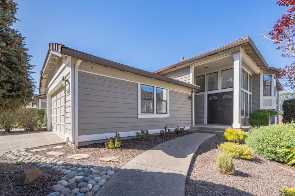 Newly reduced & now priced aggressively to get attention! This attractive and immaculate, 3 bedroom, 3 bathroom townhouse is move-in-ready and offers exceptional value! Nestled within the desirable gated community of Glen Heights in Pacific Grove, it enjoys a prime location near great schools, popular dining spots, pristine beaches, and the renowned Monterey Bay Aquarium. The heart of the home is the spacious living room, complete with a warm insert fireplace, and a generously sized formal dining room - both overlooking the deck and offering a charming peek of the ocean. The inviting primary bedroom suite serves as a private retreat, featuring a cozy insert fireplace, access to a serene deck, and well appointed bathroom with due sinks, walk-in closets, a relaxing soaking tub, and separate shower. The well-designed kitchen is sure to impress the home chef, boasting tile countertops, abundant cabinetry, and a full suite of appliances. Additional highlights include a convenient indoor laundry room equipped with a washer and dryer. Don't miss this opportunity!