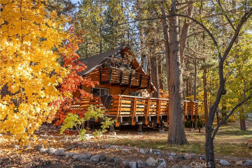 Nestled in the desirable Fox Farm area of Big Bear Lake, this charming mountain cabin offers a perfect blend of rustic ambience and modern convenience. Newly remodeled 4 bedroom with exposed beam ceilings and a cozy wood-stove hearth, the interior evokes classic alpine lodge comfort.  Located on a great 8000 Sq Ft,  corner lot,  adorned with mature pines. Located just minutes from the slopes of Bear Mountain Resort, the lake and the village, it’s equally suited for year-round retreats or rental potential in a high-amenity mountain community