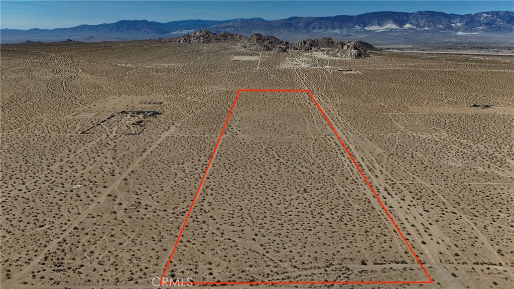 This 28.64 acre lot sits on the northeast side of Lucerne Valley and backs up to thousands of acres of government land, including the well known Cougar Buttes area. It’s a great spot if you’re into off roading, camping, or just want some space to get away from it all. The land is raw with no utilities, but that makes it perfect for a personal campsite or weekend retreat. You won’t have to worry about finding a place to stay when you head out as this gives you your own slice of desert right next to all the action.
This property does not have an address assigned. "763 Esaw Rd (NEAR)" is for listing purposes only.
APN#0448-701-10-0000
Coordinates: 34.510575 / -116.822367