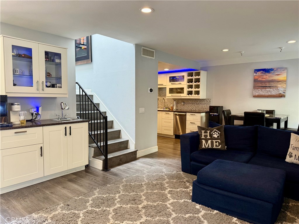 Price Improvement – Motivated Seller
Stunning 2-Bedroom Townhome in Old Agoura
Welcome to this beautifully upgraded and move-in ready townhome in the highly sought-after community of Old Agoura. Featuring two spacious master suites, two full bathrooms, and a convenient powder room on the main level, this home blends comfort with modern upgrades.
Inside, you’ll find gorgeous wood-like flooring with crisp white baseboard moldings. The remodeled and expanded kitchen boasts white soft-close cabinetry, stainless steel hardware, under-cabinet lighting, Quartz countertops, a designer mosaic tile backsplash, and newer stainless steel appliances.
The light-filled living room highlights a custom Carrera marble fireplace with fire glass, while upgrades throughout include dual-pane windows and sliding glass doors with treatments, recessed LED lighting, and a smart thermostat paired with a new A/C unit (installed 2019).
Upstairs, enjoy vaulted ceilings and a skylight (2017) for an open, airy feel. The primary suite offers a custom office/closet with built-ins, a walk-in closet, and a luxuriously remodeled en suite bathroom featuring dual sinks with marble countertops, wood-like tile flooring, and a rain shower with elegant tile detail. The second master suite includes its own full bath, built-in closet, and a private balcony.
Additional highlights include in-unit laundry, an attached 2-car garage, and access to a beautifully maintained community pool and spa.
HOA covers: Water, Trash, Exterior Insurance, Landscaping, Community Pool & Spa.
All this, just minutes from bike and horse trails, freeway access, and within the award-winning Las Virgenes Unified School District (LVUSD) with Blue Ribbon schools.