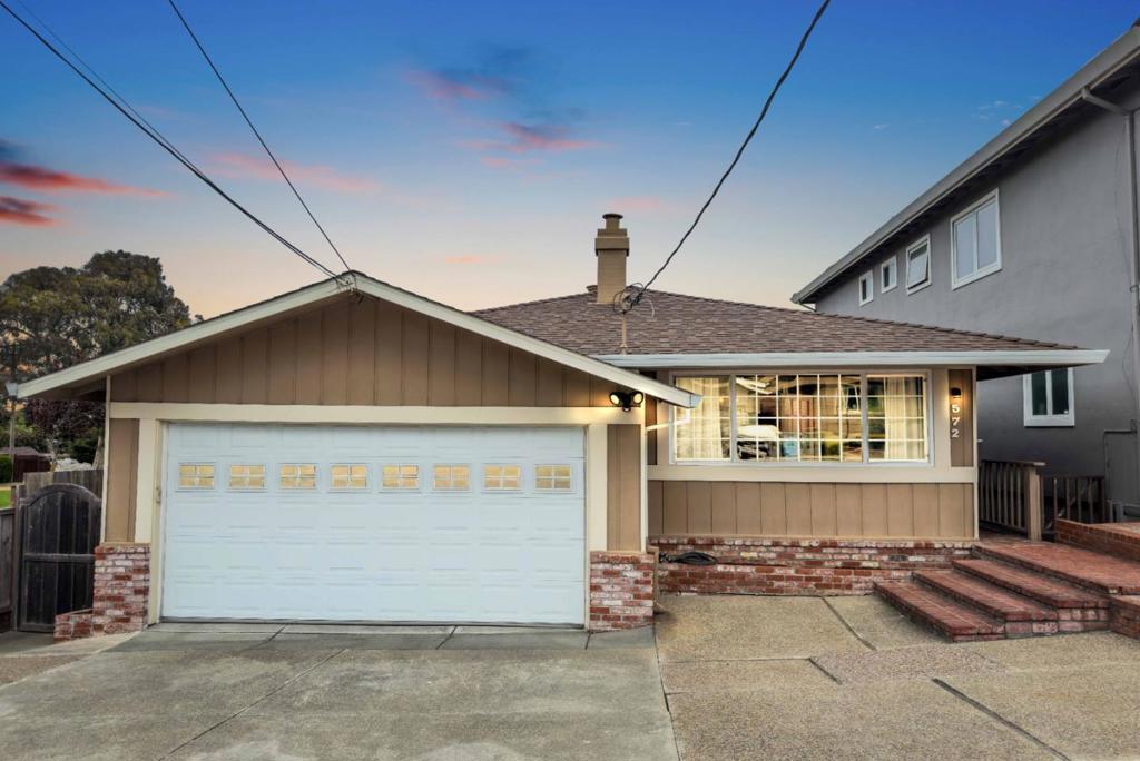 Welcome to 572 Cherry Avenue, a delightful residence nestled in the heart of San Bruno, California. This inviting property offers three bedrooms and two bathrooms across a well-designed 1,280 square feet of living space. Lovingly maintained over the decades, this home is move-in ready and brimming with potential for its next owner. The kitchen, featuring a small bar, provides a charming view overlooking the nearby park, adding a touch of tranquility to your culinary endeavors. The property boasts a spacious garage accommodating two vehicles, with additional parking for two more cars at the front of the home. Location is key, and 572 Cherry Avenue offers unparalleled convenience. Situated within walking distance to Bayhill Shopping Center, residents can easily access Mollie Stone's for groceries, a variety of restaurants, Starbucks, and CVS. For those commuting or exploring the wider Bay Area, the property is a short drive to Highway 280, El Camino Real, and BART.