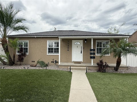 Photo of 11306 Rosecrans AVE #1, Norwalk, CA 90650 (MLS # DW26225492)