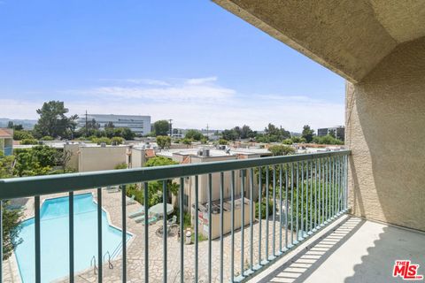 Photo of 18307 Burbank Boulevard #325, Tarzana, CA 91356 (MLS # 25618053)