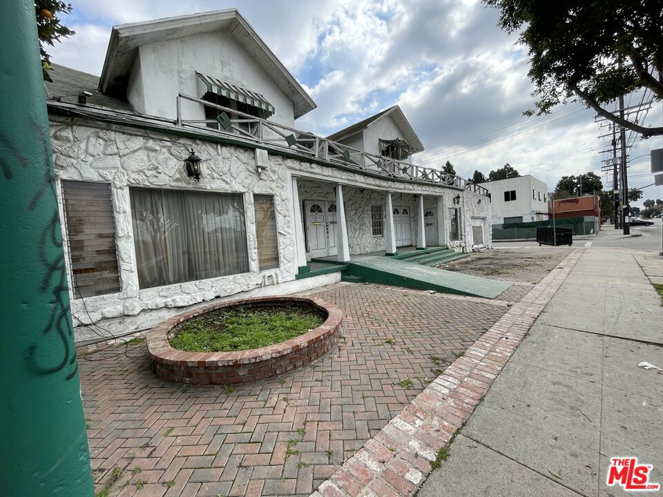 Attention builders/developers! Substantial price reduction for a 7,069 SF of land at 9920 S Central Ave. The 3,316 SF building once a Mortuary closed for several years would be a perfect Tear-Down to build low-income housing! The property is in an Enterprise Zone, TOC Tier 2 with a current zoning of C1-VL. Could possibly build a 3-4-story low-income apartment building (must check with the city). The seller has obtained a Phase 1 Report on the property and the Phase 1 Engineer recommends doing a Phase 2 inspection. Any interested parties would have to do their own investigations with the City of Los Angeles. The sellers make no guarantees or warranties, and the property is sold As-Is. WARNING: No one is allowed to enter the building . Please contact the co- listing broker, Robert Leighton, for any further information. DO NOT ATTEMPT TO GO ON THE PROPERTY WITHOUT PERMISSION AND PROPER SUPERVISION. .