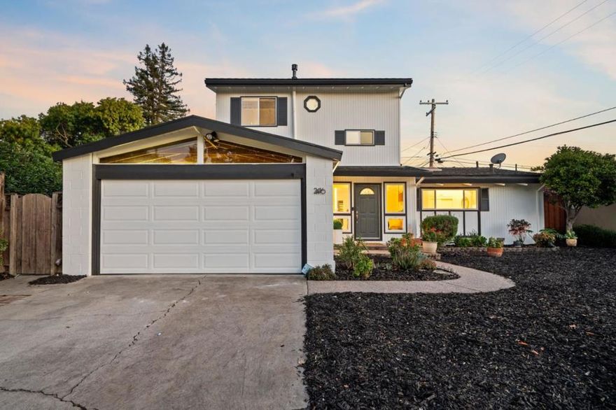 Welcome to 2416 Johnson Pl a north-facing, beautifully reimagined 5BD/3BA Santa Clara gem with 2,031 SF of living space on a 5,520 SF lot. Fresh interior & exterior paint, new SPC flooring, trim, and recessed lighting set the tone. Vaulted ceilings with exposed beams, skylights, and abundant natural light create a warm, airy ambiance. The spacious living and dining rooms share a double-sided fireplace and open to a screened lanai for seamless indoor-outdoor living. The gourmet kitchen showcases quartz & Caesarstone counters, custom backsplash, shaker cabinets, Zephyr hood, KitchenAid convection oven/microwave, Bosch dishwasher, Maytag fridge, LG cooktop, and walk-in pantry. Retreat upstairs to the primary suite with balcony views of Mt. Hamilton, office, walk-in closet, and spa-inspired bath with skylight, double vanity, frameless shower, freestanding tub, and designer finishes. Downstairs offers a Jr. suite, two additional bedrooms, and luxe remodeled baths. Landscaped yard with flagstone paths, water feature, covered patio, and mature Camphor tree. 2-car garage with storage and laundry hookups. Low Santa Clara Utilities. Convenient to Santana Row, Valley Fair, SJC, Apple, Google, Nvidia, award-winning schools, and top commuter routes 101, 280, 85 & San Tomas Expwy.
