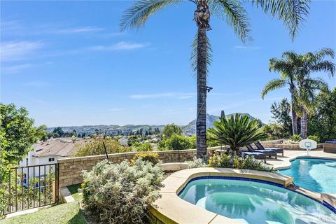 Photo of 7315 Rutherford Hill Dr, West Hills, CA 91307 (MLS # SR26054439)