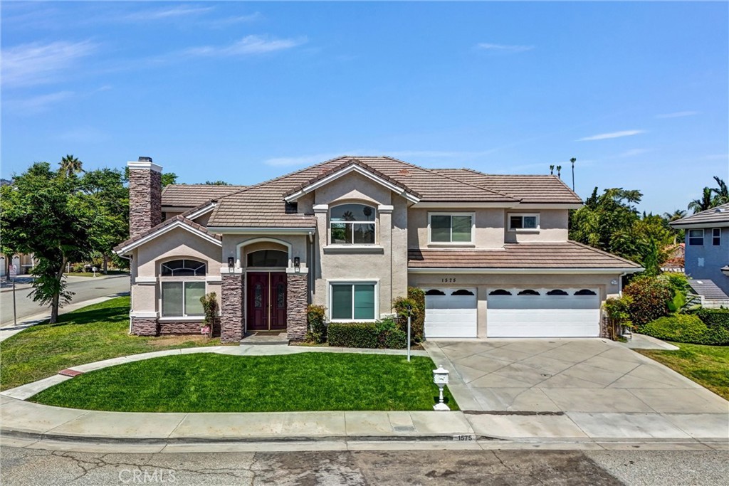 This exceptional two-story, 2,622 sq. ft. home offers 4 bedrooms, 4 bathrooms, and sits on a 6,484 sq. ft. lot. The home's features include a finished three-car garage with plenty of cabinetry and direct access to the interior. The expansive living room boasts a double-height ceiling, creating an impressive and airy ambiance.* * * * NOW Upgrades include streamlined, efficient recessed lighting throughout, a fully remodeled kitchen with a new refrigerator, gas range, range hood, and dishwasher; custom cabinetry, and quartz countertops with a breakfast nook in the fully renovated kitchen. The living room, kitchen, and family room are elegantly, uniquely, and nicely interior decorated with a newly laminated floor. Another family dining room is between the kitchen and the large family room with a cozy fireplace. Additional highlights are a bonus room, perfect for a variety of uses, and a tranquil gazebo in the backyard, ideal for relaxation or entertaining. This meticulously maintained home presents a unique opportunity for living. We believe it will be a highly sought-after property. This property also offers RV/boat parking. Its prime location offers easy access to top-rated Los Altos High School, as well as a wealth of amenities including Walmart, Costco, various shopping centers, restaurants, businesses, and parks. The property enjoys convenient proximity to the 60 Freeway (2 minutes) and Los Angeles (20 minutes). A Variety of fruit trees are planted in a large yard-- already giving fruit! This House has it all. Truly, a One-of-a-Kind Home.