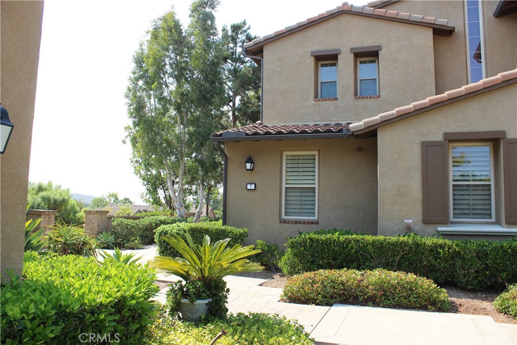 Welcome home to this stunning single level 3BR/2BA, 2,149 sq ft condo in prestigious Covenant Hills, a pet-friendly enclave in Ladera Ranch. This 24/7 gate-guarded community offers both security and serenity. Inside, enjoy stone tile flooring with high ceilings throughout, and a light-filled great room with a custom stone fireplace. The gourmet kitchen is a chef’s dream—granite island, 6-burner cooktop, French door fridge with craft ice, built-in convection oven, and stylish cabinetry. The luxe primary suite boasts a spa-style bath with soaking tub, dual sinks, private toilet room, and an enormous walk-in closet with built-ins.
Step outside to your covered loggia to take in sweeping canyon and sunset views. Tuscany’s private amenities include a spacious entertainer's yard, outdoor fireplace, built in BBQ, lush landscaping, and tranquil fountain. Enjoy full access to Ladera Ranch’s famed pools, water parks, sports fields, and year-round events. Convenient guest parking and a scenic overlook bench are just steps from your front door. This is one of the most affordable opportunities to own in Covenant Hills - don't miss your chance to call this exceptional residence Home!