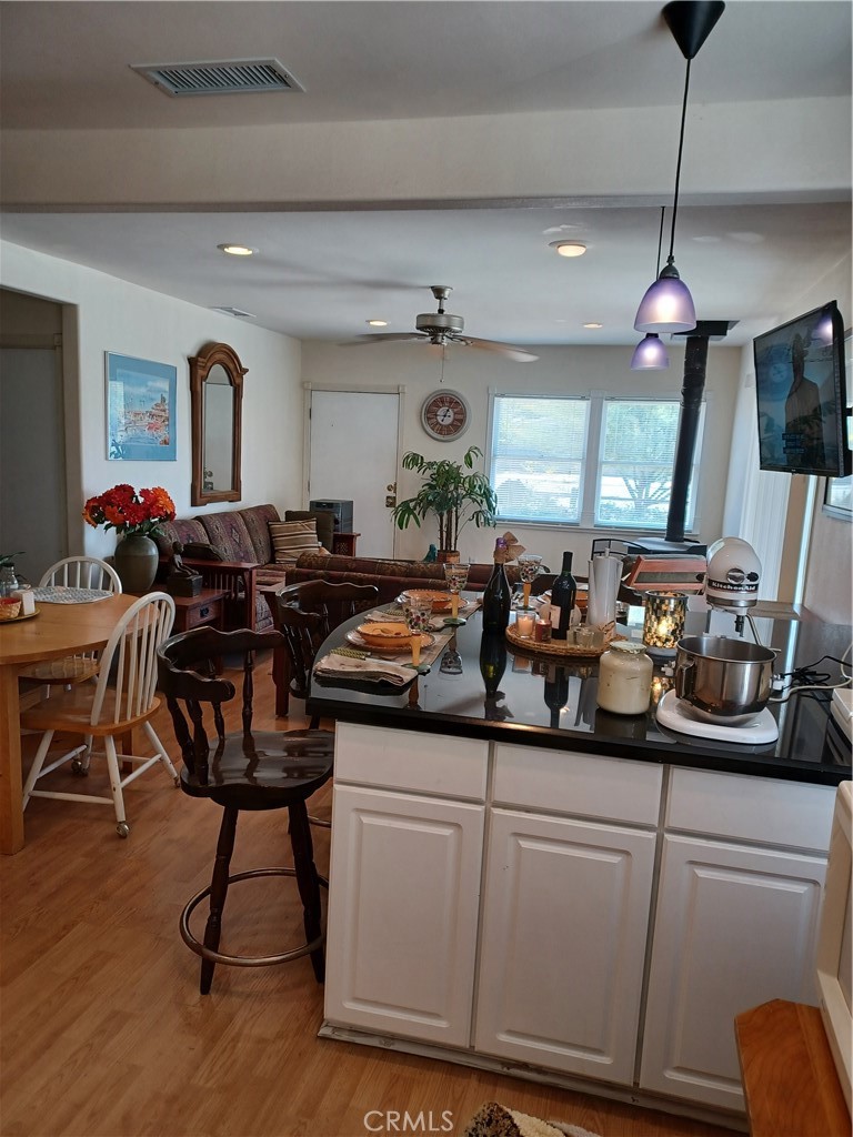 2 Single family homes on a .80 acre lot , CPS zoned lot . Front home is a 3 bedroom 1 bath , large open kitchen with an island ,home is aprox 1200 sq feet +/- . Back home is a 1 bedroom 1 bath home aprox 600 sq feet +/- . each home has its own electric meter , Property is fully fenced , Alley access on the right , So if you elect to rent out the back home, you have access off the front gate and or the side gate . APN # 548-092-041 . both homes are detached along with a detached 2 car garage . Come look and make an offer today.