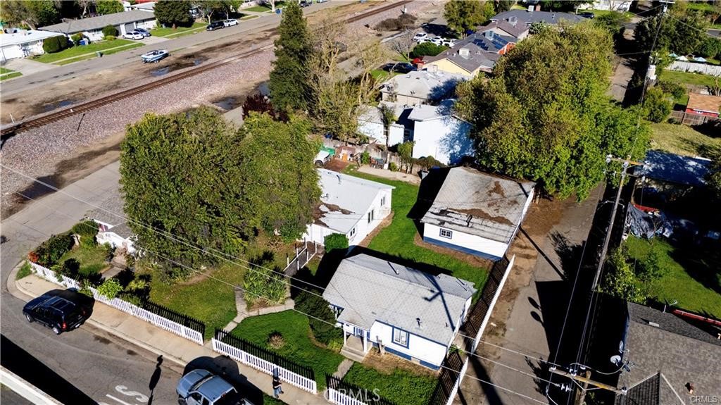Great Investment Opportunity - This unique Triplex property offers excellent potential for both investors looking to add to their portfolio and owner occupants who may be looking to live in one unit and rent the others. Situated on a spacious 11,000+ Sqft lot, this property features THREE 1 Bedroom-1 Bathroom Homes each with 570+/- Sqft of living space. One of the units is currently rented by a long term tenant, offering immediate cash flow. The other two units are vacant and feature new windows. Units are in need of some repairs, but present a solid foundation for customization and value growth. Extra large workshop and storage structure on the property presents opportunities for additional income. Property zoned R 1-6. Buyer to investigate potential to add or convert existing or additional structures. This property is a RARE find offering flexible possibilities for any savvy owner or investor. Close proximity to Highway 99, 59 and 140.