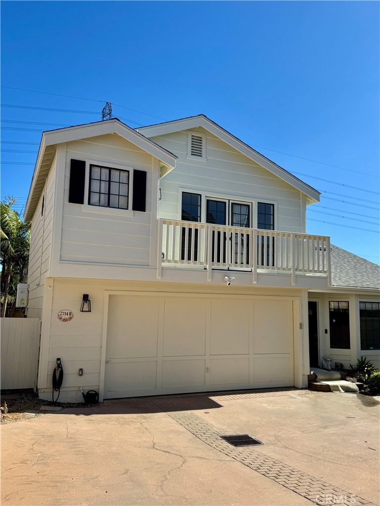 This beautifully updated home offers comfort, space, and convenience, all just minutes from the beach. Featuring all bedrooms on one level upstairs, it includes a spacious landing area perfect for a home office or play zone. With no shared walls, you’ll enjoy added privacy, and the newly painted interior and exterior, along with brand-new wooden floors throughout, give the home a fresh, modern feel. The family room boasts a cozy fireplace, complemented by two separate living areas and a dining room. The open kitchen offers plenty of cabinet space, and the home comes equipped with a new washer and dryer, air conditioning, and a second fridge in the garage. A Tesla EV charger is also installed for your convenience. Outside, enjoy a large, grassy backyard with mature trees, plus plenty of parking and a generous two-car garage. Located just off Grant Ave and east of Inglewood Ave, you're close to schools, parks, stores, and the beach.