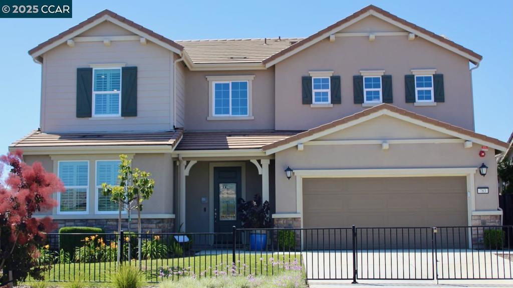 Brand new home, former model, move in ready, located in the desirable Wildhawk at Roberts Ranch community, surrounded by parks, scenic wetlands, and nature trails. Enjoy convenient access to I-80, Nut Tree Plaza, and Vacaville Premium Outlets for shopping, dining, and entertainment. Inside, the open floor plan features 9-ft. ceilings on the first floor, creating a bright and welcoming atmosphere. A downstairs bedroom offers a comfortable space for guests. The modern kitchen is a culinary centerpiece with an island, quartz countertops, and Whirlpool® and KitchenAid appliances. Upstairs, the primary bath impresses with marble countertops, a dual-sink vanity, walk-in shower, linen closet, and a spacious walk-in closet. Step outside to a covered back patio ideal for entertaining and everyday relaxation. Energy-efficient features include a smart thermostat, WaterSense® fixtures, Low-E windows, and a tankless water heater, solar included. Front and back yards professionally landscaped, large side yard could store boat or RV. Too many upgrades to list (see attachments) everything you see inside and out is included in the price. Use the builders lender and receive a credit for closing costs.
