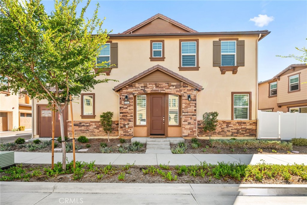 Welcome to a perfectly kept home in the heart of Temecula! Just steps from Harveston Lake, the Temecula Public Library, and top-rated Ysabel Barnett Elementary & Chaparral High School, this 4 bed, 2.5 bath townhome offers the ideal blend of location, lifestyle, and value. With 1,714 sq ft of living space, this home lives like a detached single family home, complete with a private, beautifully landscaped backyard and an open, sunlit floor plan. The bright kitchen features modern quartz countertops, and the entire home has been thoughtfully upgraded and meticulously maintained. Enjoy 8 fully paid-off solar panels that have eliminated electric bills, making this home exceptionally energy efficient with ultra-low utility costs. This corner unit boasts added privacy, extra windows for natural light, and an oversized 2-car garage with epoxy flooring. The HOA covers structural insurance, exterior maintenance (including roof, paint, and front landscaping), meaning you get all the benefits of homeownership without the hassle, plus much lower homeowners insurance than a detached home. Community amenities include a clubhouse, pool, spa, parks, zipline, table tennis, dog park, and regular neighborhood events. Perfectly situated just minutes from Trader Joe’s, Promenade Mall, Old Town Temecula, local wineries, and with quick access to both the 15 & 215 freeways. This is the perfect low-maintenance home in one of Temecula’s most walkable and desirable neighborhoods!