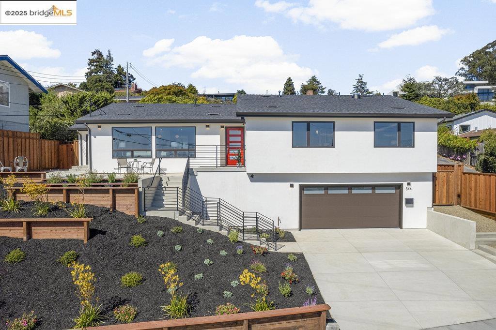 Set in a coveted locale known for sweeping views, this impeccably updated home is framed by scenic vistas from city skyline to Golden Gate Bridge. Stripped to the studs and spectacularly reimagined, the single-level stunner has been transformed with white oak flooring, Marvin windows, and LED lighting. Decked in Thermador appliances, a quartz-clad kitchen bleeds into sunlit living room with panoramic views. Nearby, a bright dining area spills into a sunny patio, perfect for morning coffee. Equipped with 2 gracious primary suites and a pair of generous bedrooms, four lavish baths have been appointed with Porcelanosa tile, toilets and fixtures. A site-driven home designed for the landscape, this hilltop hideaway features a low maintenance yard with terraced landscaping, turf and patio poised for BBQs. Replete with 2-car garage and ample storage, 844 Gelston is zoned for the highly rated Kensington Elementary and located within minutes to all El Cerrito has to offer. Sunday Open's 8/17 and 8/24 2-4:30pm. Views: Downtown