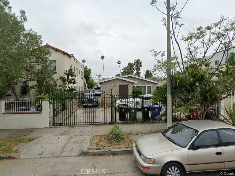 Photo of 1521 S Cloverdale Ave, Los Angeles, CA 90019 (MLS # PW26019978)