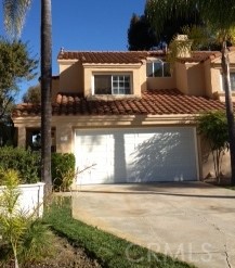 Desirably located at end of Cul-de-sac with one of the largest lots in the tract. Lovely hills and city lights views. Light and bright with a big back yard, New dual pane windows. Main floor bedroom and bath. Close to award winning schools, Chapparosa Park and walking path to the beach. Washer/Dryer and Refrigerator included in lease price. Available approximately 11/19/25.