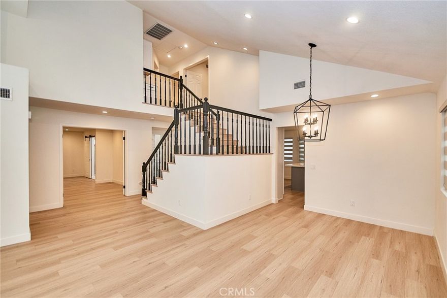 Stunning fully remodeled Temecula home showcasing modern elegance and thoughtful upgrades throughout. This open-concept residence features white oak engineered wood flooring, recessed lighting, and contemporary fixtures, creating a bright and inviting atmosphere.
The upgraded chef’s kitchen is equipped with custom two-toned Koville cabinetry, quartz countertops, soft-close drawers, and new stainless-steel appliances. New windows and sliding doors fill the home with abundant natural light.
Offering 4 bedrooms and 4 full bathrooms, each bedroom includes its own private bath—a rare and highly desirable feature. The home includes two primary suites (one upstairs and one downstairs), providing exceptional flexibility for multi-generational living or guests.
Additional highlights include owner-installed solar panels for energy efficiency, a spacious laundry room, a bonus storage room with a second refrigerator water line, and a large, professionally landscaped backyard with fruit trees and low-maintenance design. The extra-long driveway provides ample parking and is ideal for RV or recreational vehicles.