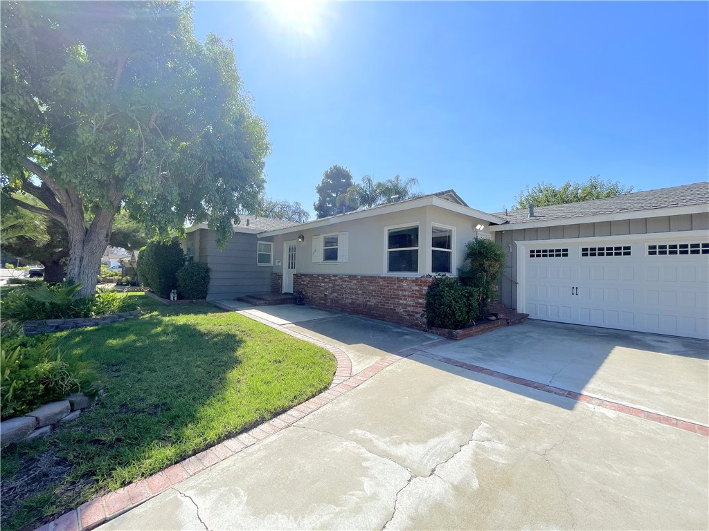 Single-Story 3-Bedroom Home in North Glendora! Spacious Living Room with a Fireplace, Wood, Tile, and Carpet Flooring throughout the home, Central AC/Heat, and Ceiling Fans in each bedroom. Nice Kitchen with Granite Countertops, a Stove/Oven (electric), Refrigerator, Microwave, and Garbage Disposal. Washer/Dryer Hookups are in the garage. The Slider in the Living Room opens to a Large Fenced Backyard with a Covered Patio and Shed for Extra Storage. In addition to the 2-Car Attached Garage there is ample Driveway Parking. Gardening Provided! No Pets Please.