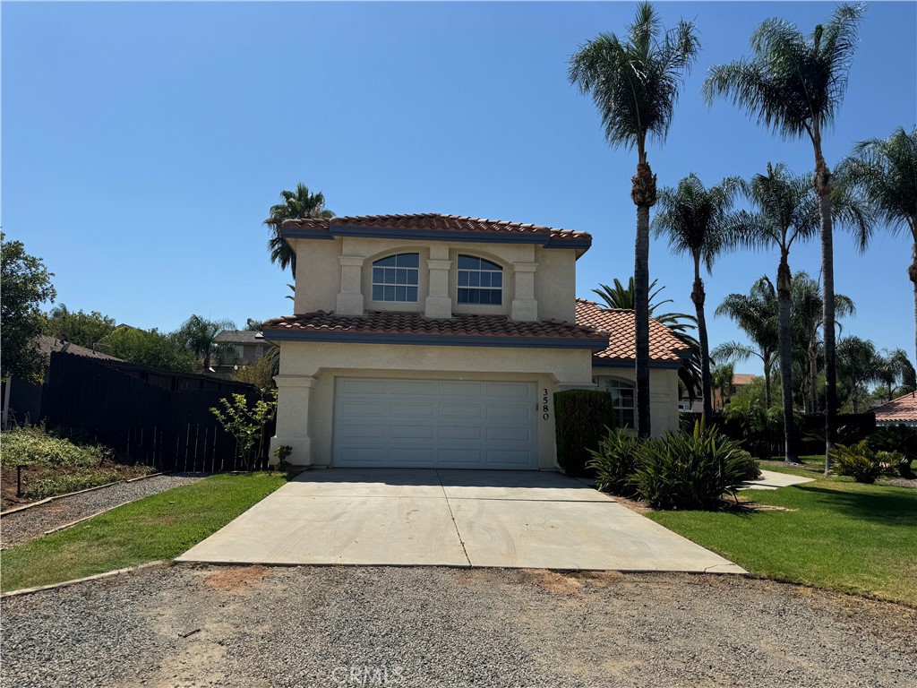 Welcome to South Corona! This beautiful two-story home is located in the highly desired school district of Santiago High School. The home features 3 bedrooms, all situated upstairs, along with 2 1/2 bathrooms. The living room boasts a stunning vaulted ceiling, while the family room includes a cozy fireplace and a convenient wet bar. You'll also have access to a 2-car attached garage and a spacious, lovely backyard. Additionally, the landlord covers the cost of the gardener.