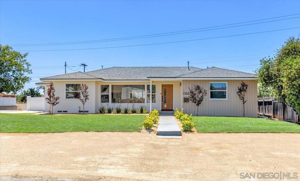 Modern ranch-style 3 bed, 3 bath home with breezy coastal vibes, perched atop a hill in highly desirable Fletcher Hills. Situated on a spacious 0.25-acre lot with a sparkling pool, this light-filled home features an open floorplan with seamless indoor-outdoor flow—perfect for entertaining. The kitchen is a standout with quartz countertops, chic tile backsplash, stainless steel appliances, pot filler, and rattan pendant lighting over the breakfast bar. Recent upgrades include new plumbing, new HVAC, and energy-efficient vinyl windows for year-round comfort. The crown jewel is the private, park-like backyard complete with a large covered patio, pool, and expansive lawn—an ideal retreat for gatherings or quiet relaxation.