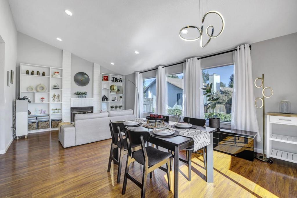Privately tucked away from the street at the top of the hill, this stunning two-story single-family home offers panoramic, unobstructed mountain views, along with 3 bedrooms and 3 full bathrooms. Interior features a living room with a vaulted ceiling, fireplace and lots of bright, natural light. The dining area opens to a spacious exterior deck for the indoor-outdoor living, perfect for afternoon BBQ's. Two large en-suite bedrooms upstairs, each can fit a king-size bed, plus a bedroom and full bath on the main level. Updates include new water softener system, European style modern kitchen cabinets, quartz countertop, kitchen island, newer range and hood, newer stainless steel dishwasher, LED recessed lights/fixtures, trendy and welcoming wall paint, laminate hardwood floor, central heat, and more! All bathrooms are updated with tile flooring and walls. Attached 2 car garage comes finished with epoxy flooring. Located near several parks, Westfield Valley Fair, shopping centers, Silver Creek, Ranch Golf Club, Marina Grocery, Safeway, Starbucks coffee, with easy access to 101 freeway for the commuters, 2 miles from Valley Christian Schools, and so much more. Welcome home to 610 Skyway Drive!