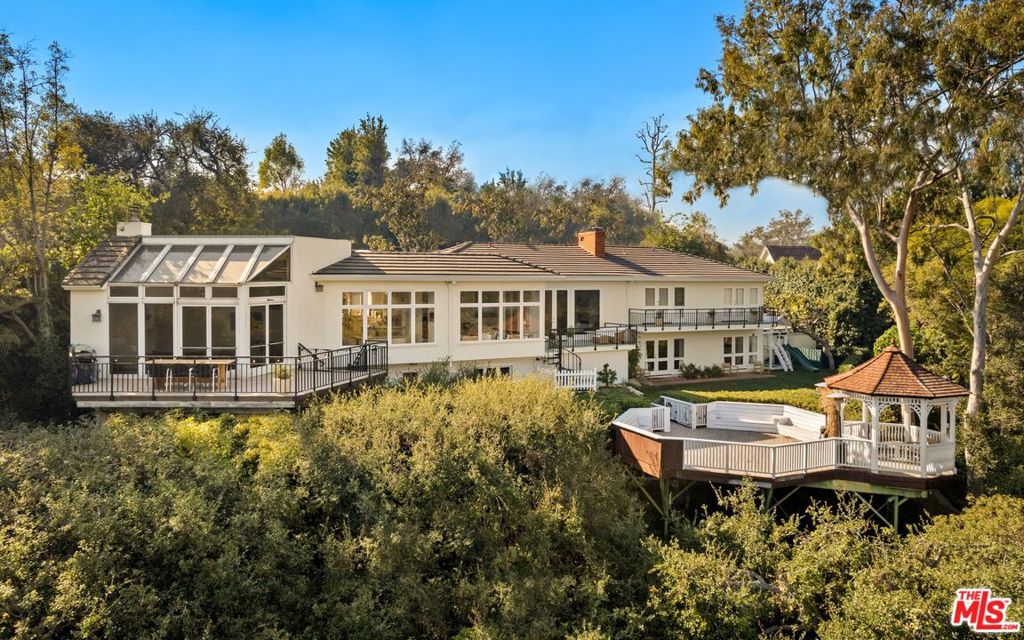 Available August 15th, One-Year Lease, Fully Furnished. Perched above the renowned Bel Air Country Club, this newly renovated 4-bedroom, 4.5-bath home offers approx. 4,000 sq ft of refined living space with breathtaking views, ultimate privacy, and timeless elegance. Flooded with natural light from floor-to-ceiling windows, the home features: *Spacious open floor plan with high ceilings *Gourmet kitchen with top-of-the-line appliances and large island *Cozy family room and dining areas--perfect for entertaining *Luxurious primary suite and a brand-new walk-in closet *Fully updated floors, kitchen, bathrooms, and living spaces. Step outside to a newly landscaped outdoors with: *Large pool with a new heater and spacious backyard complete with a custom playset ideal for children*Ample lounge space and decks for relaxing or hosting *Multiple balconies and a charming gazebo for serene views and fresh air Nestled on a quiet, secure cul-de-sac in a family-friendly neighborhood, this turnkey Bel Air retreat provides convenient access to top-rated schools, parks, and local amenities. Experience the perfect blend of comfort, style, and sophistication in this exceptional Bel Air residence.