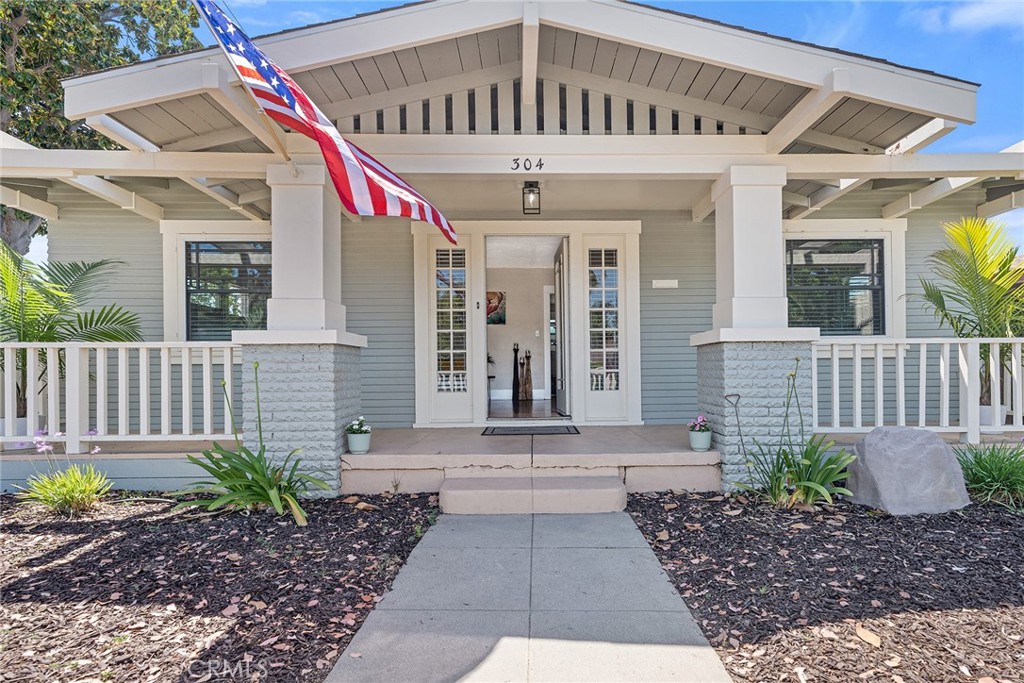 Welcome to 304 N Waverly. This 1935 classic craftsman bungalow is located on a corner lot and has excellent curb appeal. Front porch and decks allow for outdoor living. The living room features built-in bookcases, a fireplace, and a built-in secretary's desk. Refinished hardwood floors and freshly painted interior and exterior. Brand new central heating and air conditioning system. New kitchen stainless steel appliances and a new laminate life-proof wood floor in the kitchen and laundry room. The kitchen features a cozy breakfast nook. The classic kitchen has the original cabinets and tile counters. The new stainless refrigerator is included. 2 bedrooms with a Jack and Jill closet. The bath has a pedestal sink and a tub/shower. Custom fencing and decking make this a great place to call home. Walk to school, the Plaza, or Chapman University. The happiest place on earth is not in Anaheim, it is downtown, Old Towne Orange.
