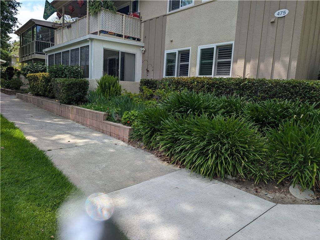 Photo of 475 Calle Cadiz #D, Laguna Woods, CA 92637 (MLS # OC26070016)