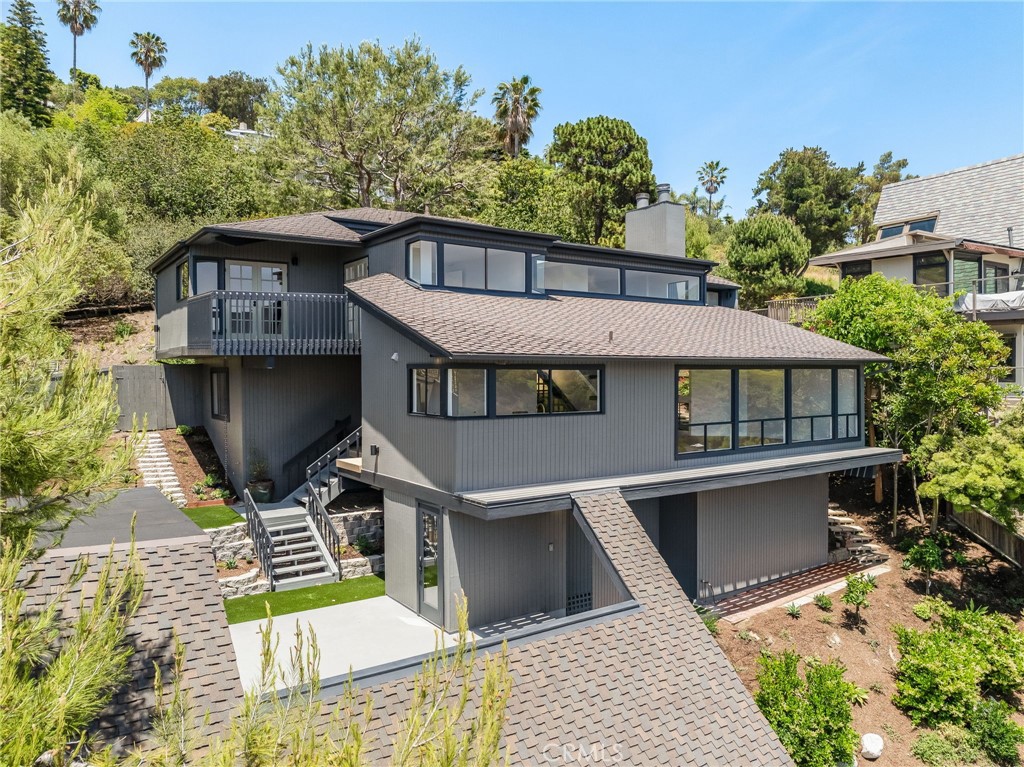 Now available unfurnished for a yearly lease, be the first to live in this recently remodeled Laguna Beach home! Experience coastal living at its finest from this architecturally distinctive home perched above Laguna’s vibrant village in the coveted lower Temple Hills neighborhood. With panoramic ocean vistas from all main living areas, 1450 Terrace Way is designed for those who value both beauty and tranquility. This serene residence offers a front-row seat to sunset skies, gentle ocean breezes, and the charm of year-round life by the sea. Located on a quiet one-way loop street, it provides both privacy and proximity, just moments from downtown Laguna and its renowned beaches, galleries, and dining. Inside, the home has been thoughtfully updated with high-end modern finishes while honoring its original creative character. The peaceful primary suite is an ideal retreat, complemented by guest bedrooms that offer direct outdoor access. Expansive decks invite seamless indoor-outdoor living, perfect for entertaining or simply enjoying the view.
Additional highlights include a rare three-car garage, generous storage throughout, and a detached bonus space—ideal for a home office, studio, or media room.