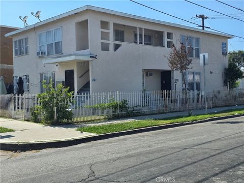 Photo of 301 W Magnolia Street, Compton, CA 90220 (MLS # DW26008414)