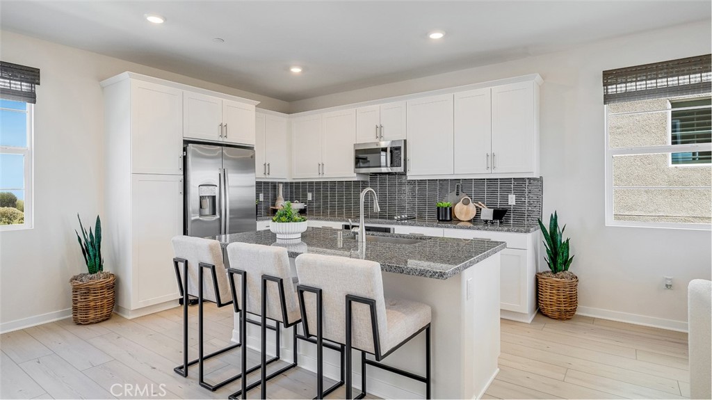 NEW CONSTRUCTION! This new three-story home features an inviting open-concept layout on the second floor, blending the kitchen, living and dining areas for seamless transitions and multitasking, while a nearby deck provides convenient indoor-outdoor living. All three bedrooms are located on the third floor for optimal comfort and privacy, including a luxurious owner’s suite with a full bathroom.
Allure brings new single-family homes to the Nuvo Parkside masterplan, now selling in Ontario, CA. Residents will enjoy access to available amenities within the gated masterplan, including a clubhouse and BBQ area. A future Great Park and Sports Arena are planned to be built near the community. Enjoy an array of shopping and dining options at nearby Ontario Mills Mall, or catch a live concert at the Toyota Arena. Plus, the Ontario Airport is a short drive away.
