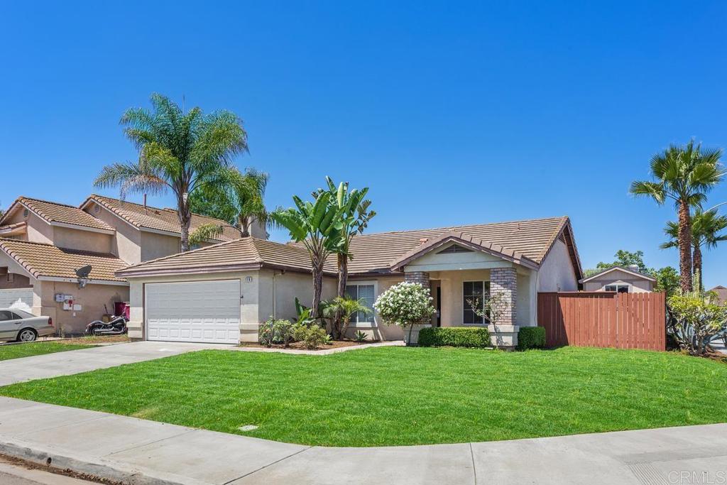 Seller entertaining offers between $835,000 - $855,000. Welcome to your Pacific Breeze retreat — a stunning single-level, 3-bedroom, 2-bath home perfectly positioned on a desirable corner lot with refreshed landscaping in one of the area’s most sought-after neighborhoods. Step inside to an inviting open-concept living space featuring soaring vaulted ceilings, skylights that flood the home with natural light, ceiling fans, paid solar, and a cozy fireplace for relaxing evenings. The remodeled kitchen boasts granite countertops, stainless steel appliances, and ample storage — ideal for both everyday living and entertaining. The spacious primary suite offers a vaulted ceiling and peaceful ambiance, while two generous secondary bedrooms provide flexibility for guests, an office, or hobbies. Outdoors, a large backyard awaits — an above-ground hot tub, mature fruit trees, and a beautifully landscaped side yard with drought-tolerant palms, succulents, and fresh sod with new irrigation. Located in a peaceful community just one block from the protected San Luis Rey River's serene surroundings. Only minutes to the Oceanside Pier, beaches, shopping, dining, and major highways — this home offers the perfect blend of comfort, convenience, and coastal charm.