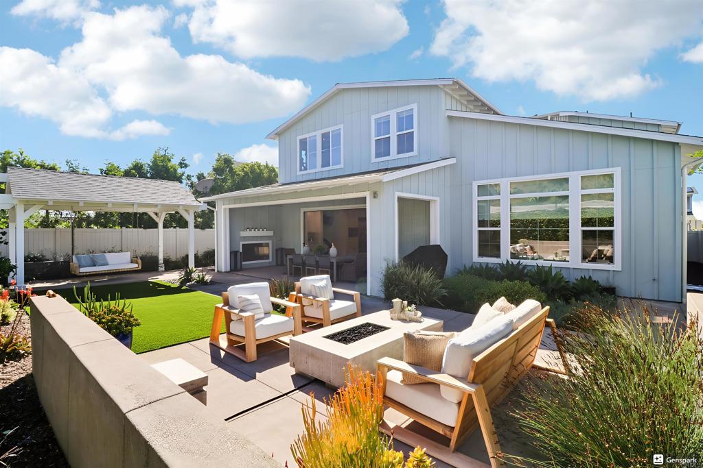 Rare offering at 665 Sea Ridge Ct providing Coastal living at its best. This modern, light-filled home delivers an open floor plan that most buyers desire: a central great room flowing to dining and a chef’s kitchen with coffee station, butler’s and walk-in pantry. Stunning wood floors throughout, high ceilings, and an ensuite bedroom on the main level, along with a flex space off the kitchen adapts easily for an office, playroom, or exercise area. Expansive bifold doors blur the line between indoors and out, creating an effortless entertaining zone. Upstairs includes an elegant primary suite with large walk-in closet and lavish bathroom, spacious secondary bedrooms which are joined by a versatile loft/retreat and a convenient laundry room. The oversized 3-car garage features epoxy floors, a Halo water filtration system, leased solar system, and a tankless water heater. Outside, enjoy a low-maintenance yard with multiple sitting areas, lush landscaping, and a recently installed outdoor shower. From the welcoming front porch and multiple areas inside, take in ocean and sunset views that remind you why you live here. 1.1 miles to the ocean and the Village of Encinitas giving the ability to walk or bike to breakfast, coffee, and so much more.  This is not only a beautiful home but a coastal lifestyle all in one!