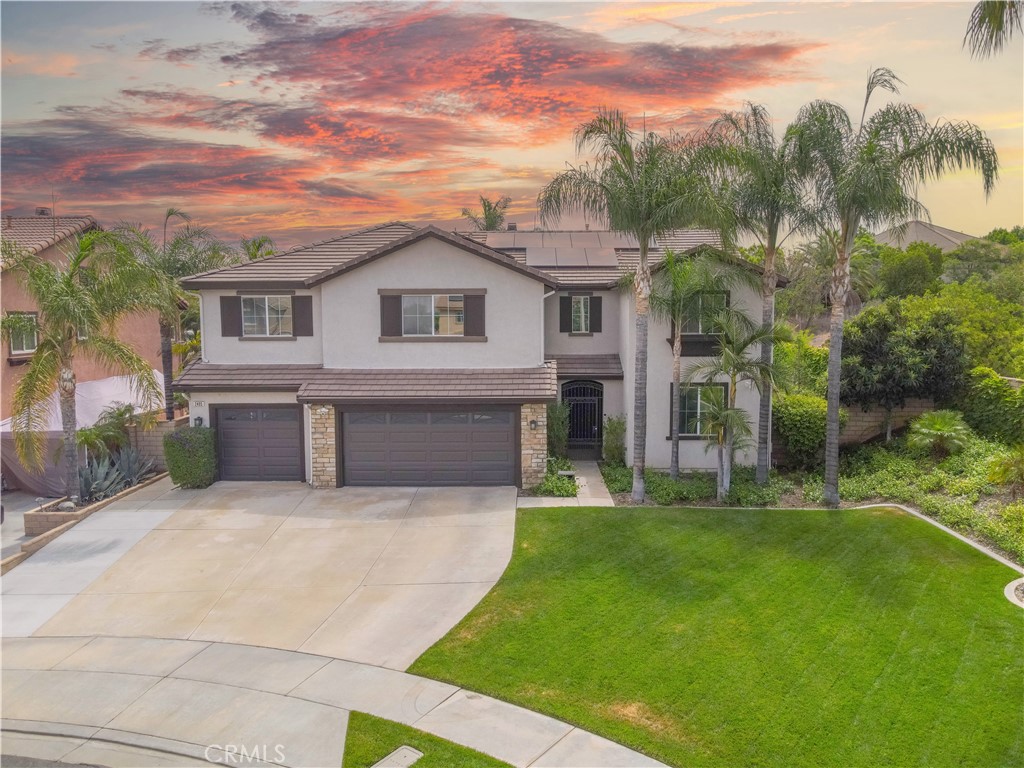 NICEST PROPERTY ON HANNUM CIR! GORGEOUS TWO STORY UPGRADED "CUL DE SAC" HOME!! Located in the Heart Of Corona, This Home Offers WELCOMING CURB APPEAL With A HUGE FRONT LAWN! This GORGEOUS OPEN FLOOR PLAN 5 Bedroom 3 Bathroom SHINES IN UPGRADES AND ELEGANCE! You'll Fall In Love With The OPEN KITCHEN, WALK-IN PANTRY, And BEAUTIFUL GRANITE COUNTERTOPS, UPGRADED LIGHT FIXTURES, UPSTAIRS LOFT, SPACIOUS MASTER BEDROOM WITH HIS AND HERS CLOSETS AND WITH A GRAND BATHROOM, WALK IN SHOWER AND TUB. BACKYARD BOASTS CUSTOM WRAP-AROUND EXTERIOR HARDSCAPE, TWO COVERED PATIOS, SPA And Multiple Seating Areas Making It the PERFECT PLACE FOR ENTERTAINING! CONVENIENTLY LOCATED NEXT TO FWYS, SHOPPING, PARKS, WALKING TRAILS & RESTAURANTS! Orange County Is A Short 15 Minute Drive Away! Your Family Is Sure To FALL IN LOVE With This Home!