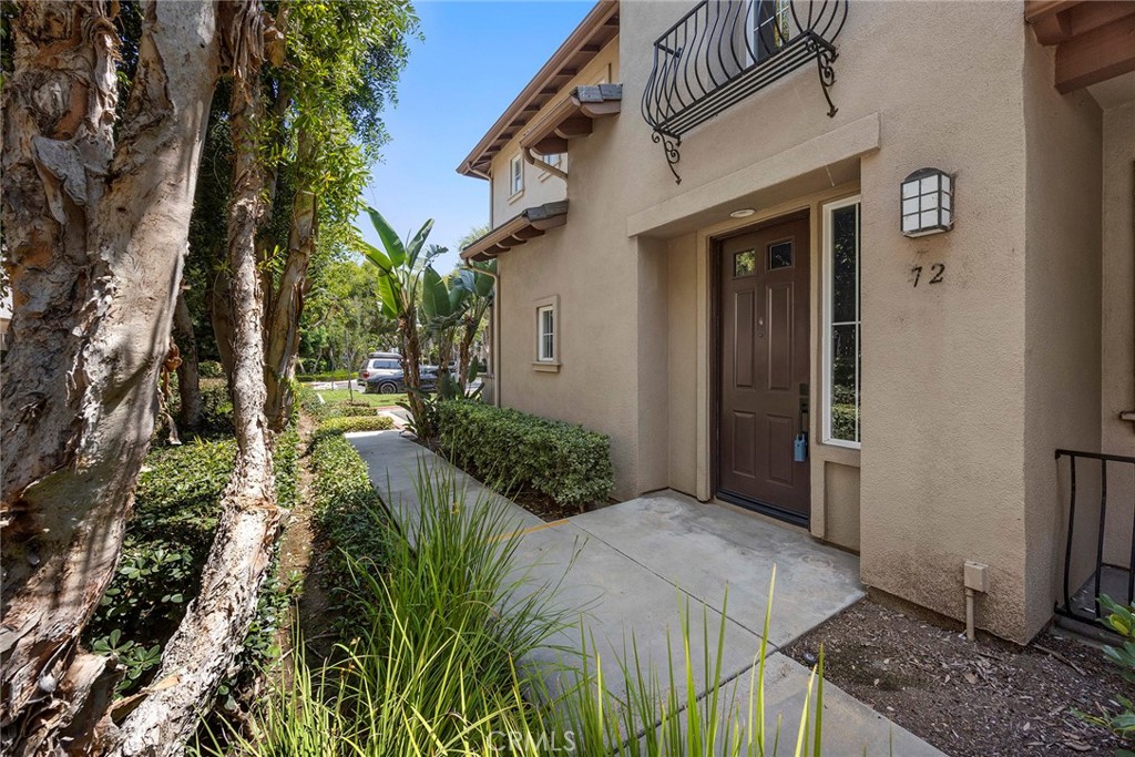 Welcome to 72 Salton in the desirable San Juan Bautista neighborhood of North Park Square. This beautifully maintained upper-level single-story end unit, built in 2002, offers 2 bedrooms, 2 bathrooms, and 1,462 square feet of thoughtfully designed living space with a private entrance and direct-access two-car garage below. Inside, tall ceilings, abundant windows, and recessed lighting create an open, airy feel, complemented by engineered hardwood flooring, upgraded carpet, and a cozy gas fireplace. The updated kitchen features new cabinetry, quartz countertops, a tile backsplash, stainless steel appliances, and a walk-in pantry, with the adjacent laundry room including a side-by-side washer and dryer, plus the refrigerator—all included. The spacious primary suite has a ceiling fan, walk-in closet, and an en-suite bath with dual sinks, soaking tub, separate shower, and private water closet, while the secondary bedroom, located on the opposite side for privacy, offers direct access to a large outdoor deck shared with the living room. Zoned for Hicks Canyon Elementary, Orchard Hills Middle, and Beckman High, and conveniently close to shopping, dining, and major freeways, this home blends comfort, style, and convenience in one of Irvine’s most sought-after communities.