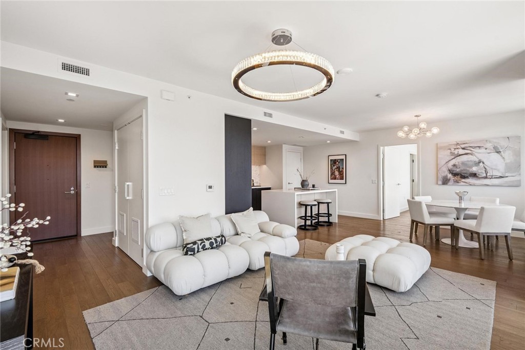 Experience upscale urban living at 1388 Kettner Blvd, Unit 3303, a stunning, fully furnished 2-bedroom, 2-bath residence in Savina, one of San Diego’s premier luxury high-rise buildings. This sophisticated home offers an open-concept layout with floor-to-ceiling windows showcasing breathtaking views of the city skyline and San Diego Bay. The modern kitchen features sleek quartz countertops, stainless steel appliances, and a spacious pantry, seamlessly flowing into a bright and airy living space perfect for entertaining or relaxing. The primary suite provides a tranquil retreat with a generous walk-in closet and a spa-inspired bathroom with dual vanities and a frameless glass shower, while the second bedroom offers flexibility for guests or a stylish home office. Additional highlights include in-unit laundry, high-end finishes throughout, and a serene, contemporary design.
Savina residents enjoy a collection of premium amenities including a resort-style pool, rooftop lounge with fire pits and BBQ areas, a state-of-the-art fitness center, and a private entertainment lounge. With 24/7 concierge service, secured entry, and dedicated garage parking, every detail has been thoughtfully designed for comfort and convenience. Ideally located in the vibrant Little Italy neighborhood, you’ll be steps from acclaimed restaurants, boutique shops, the waterfront, and cultural attractions. This is an exceptional opportunity to live in one of downtown San Diego’s most sought-after addresses, offering the perfect blend of luxury, style, and city excitement.