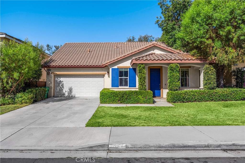 Don't miss your Opportunity to Own this Former MODEL Home Located in the SUNNYMEAD RANCH COMMUNITY Walking Distance to Lake & Resort Style Amenities! Amazing Floorplan SHOWS & FEELS like a SINGLE STORY home with the Majority of the Living Area on the MAIN LEVEL - Including the PRIMARY BEDROOM with EN-SUITE BATHROOM as well as a Secondary Bedroom & FULL BATHROOM! Front Entry with Covered Front Porch Welcomes you into the Living Room & Formal Dining Room with Custom Window Coverings & Niche for Dining Hutch. A Double Door Entry Leads into a DEN/OFFICE with Beautiful Built in Cabinetry (possible 4th Bedroom!). Kitchen is Open to the Family Room and Features Under Cabinet Lighting, Plenty of Storage & Countertop Space as well as room for an Island or Casual Dining. Family Room has Vaulted Ceilings with Loft View, Built-in Entertainment Center, Cozy Fireplace and Back Patio Access. Indoor Laundry Room comes with Washer & Dryer Included! Upstairs you'll find a Loft Space with Built in Entertainment Center and 2 Desk Spaces as well as another Bedroom with Generous Walk-in Closet & Full Bathroom! Amazing Hillside Views can be Enjoyed from several rooms of the home. Just a short walk to the Community Lake as well as the Lake Club Featuring Several Sports Courts, Pool & Spa, Gym, Clubhouse, Fishing & Community Activities for a SUPER LOW HOA of only $127!!